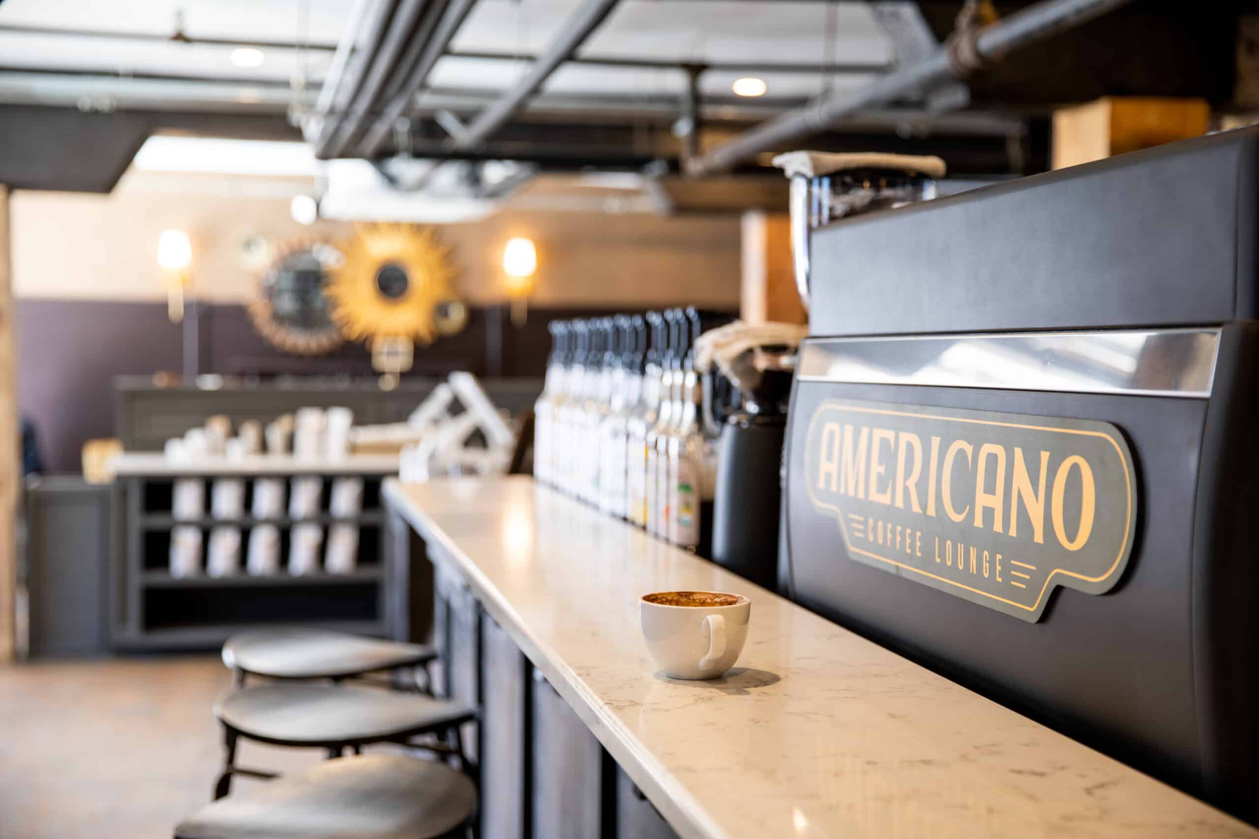 In a black and beige-themed cafe