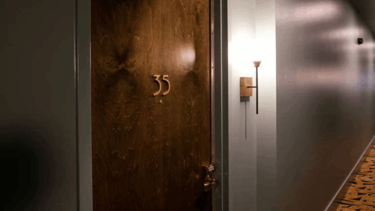 The artful blend of adaptive reuse and hospitality design come together in our historic downtown hotel renovation at the iconic Woolworth on 5th building for a high-end Airbnb.