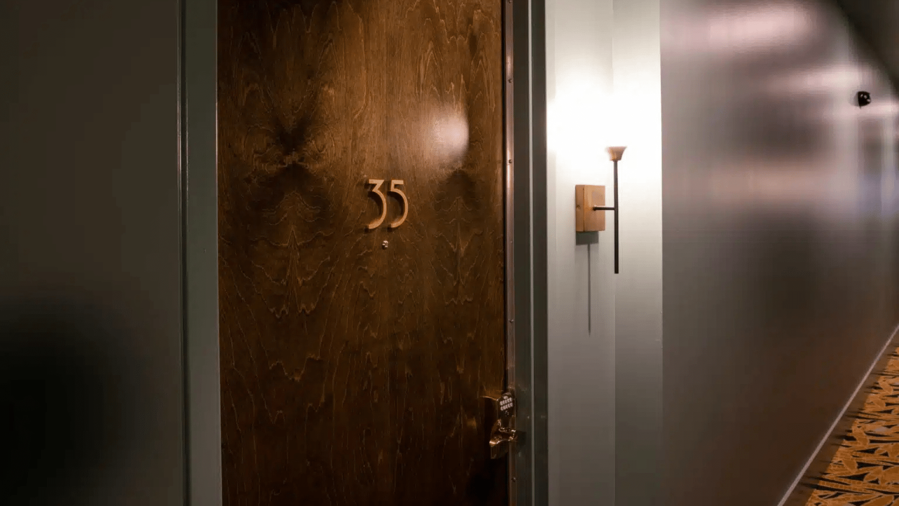 The artful blend of adaptive reuse and hospitality design come together in our historic downtown hotel renovation at the iconic Woolworth on 5th building for a high-end Airbnb.