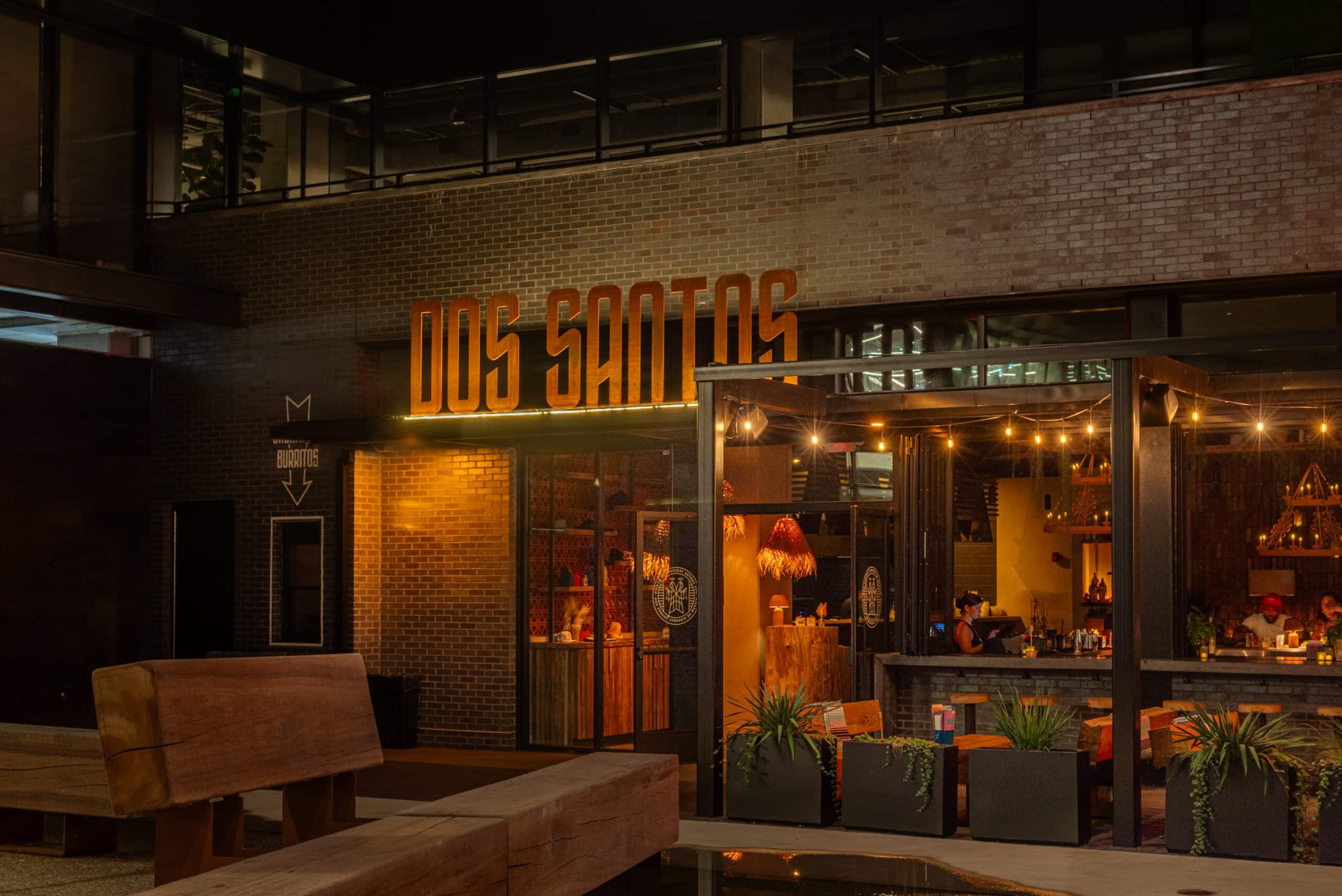 Home 5 a building with a sign on the front