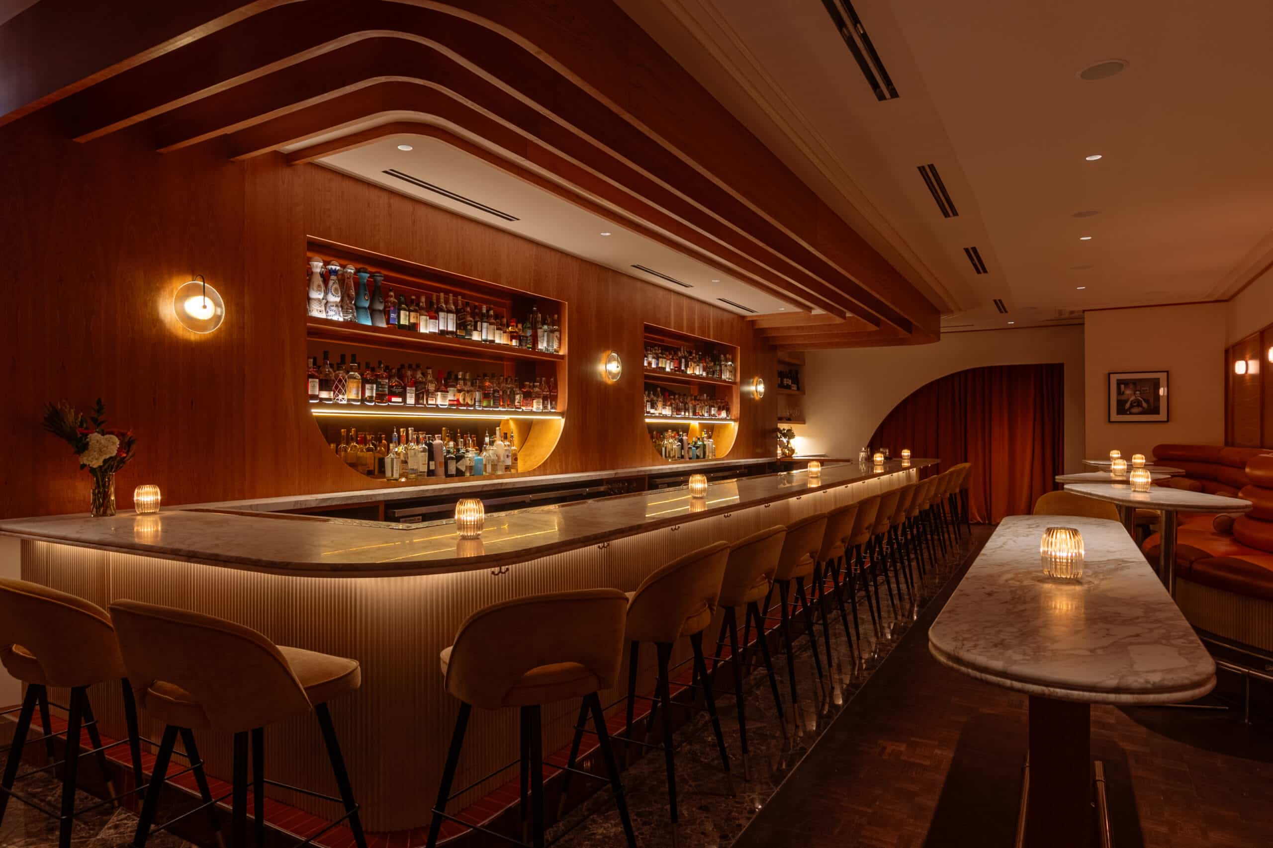 Home 8 a bar with a counter and chairs